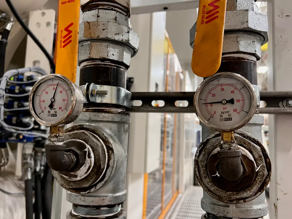 Pressure gauges and valves on a process water line