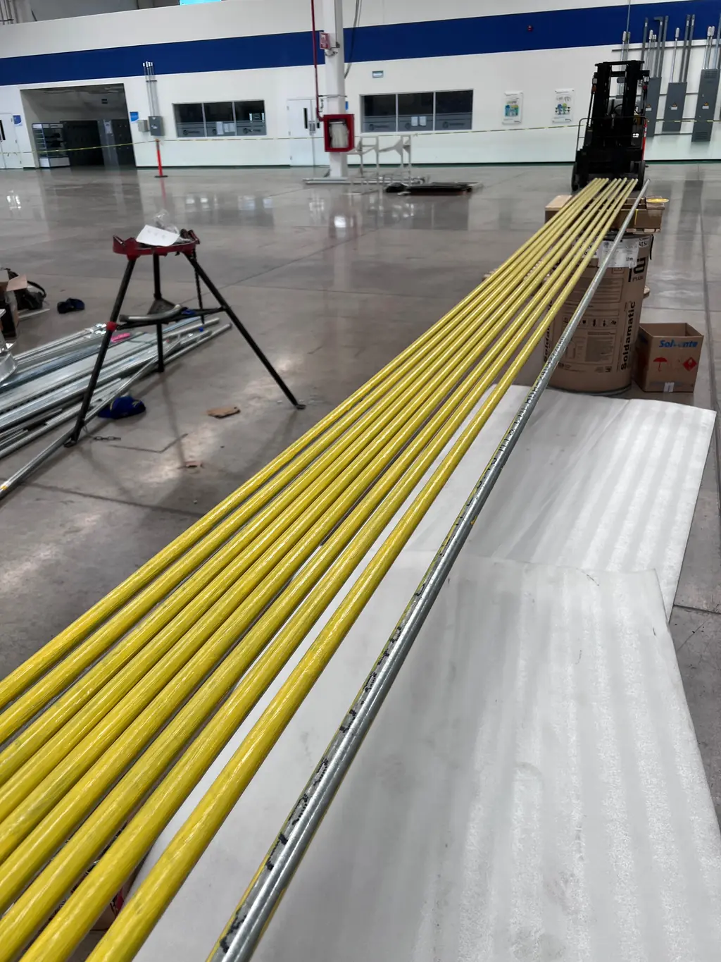 Pipe runs staged for installation on site